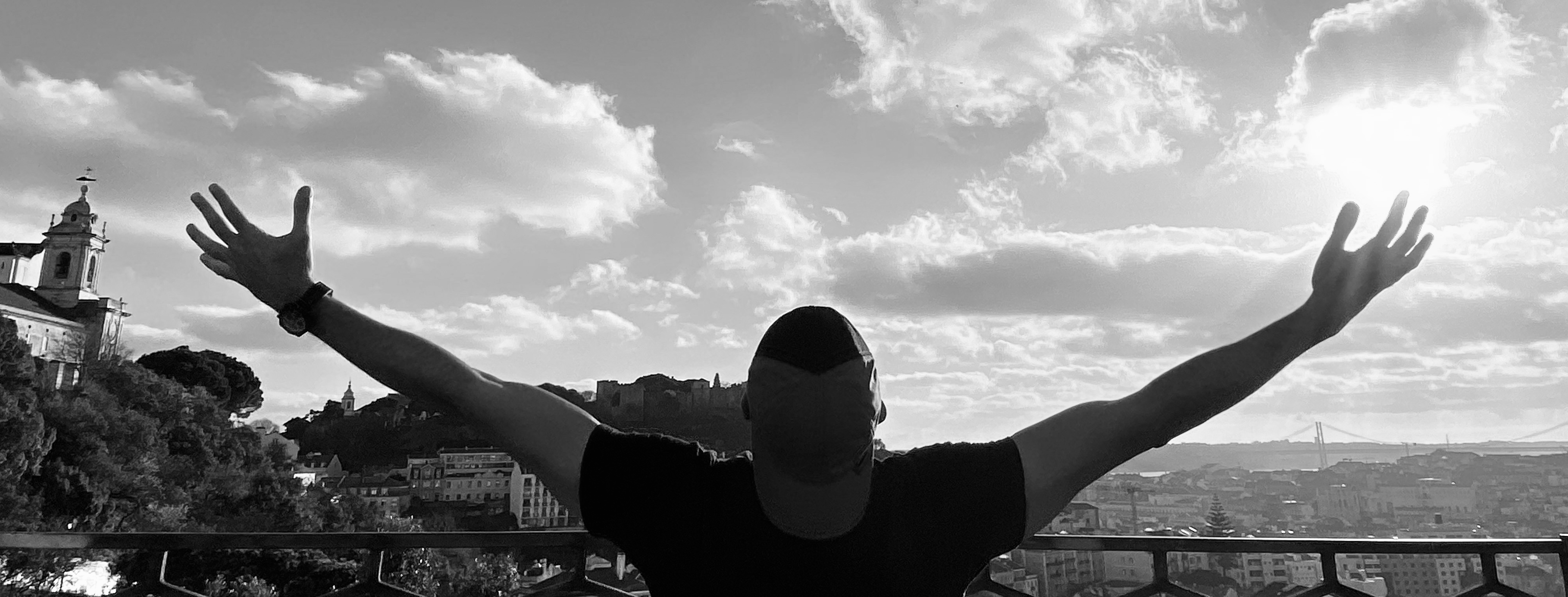 Ben Fahimnia with arms raised